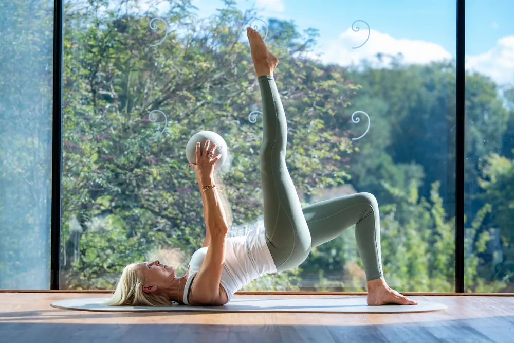 Sarah Clough demonstrating a Pilates bridge